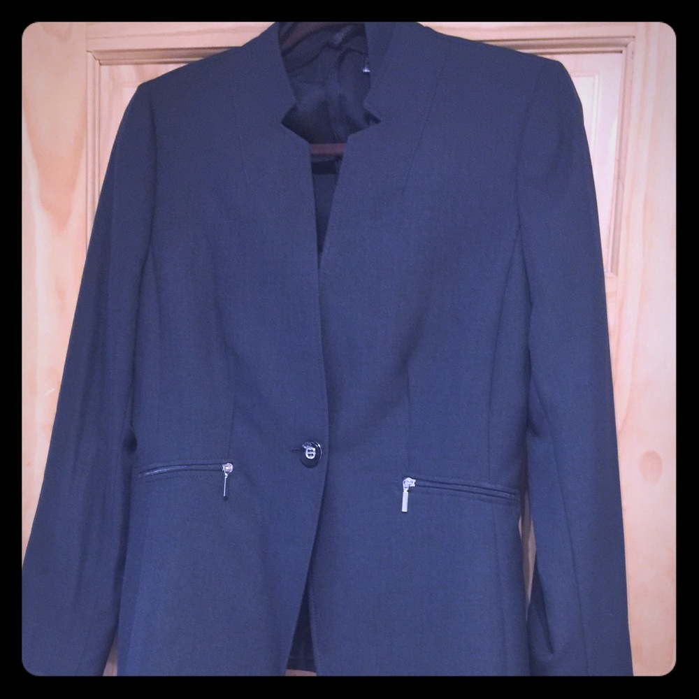 Brand new Tahari women’s business suit.
